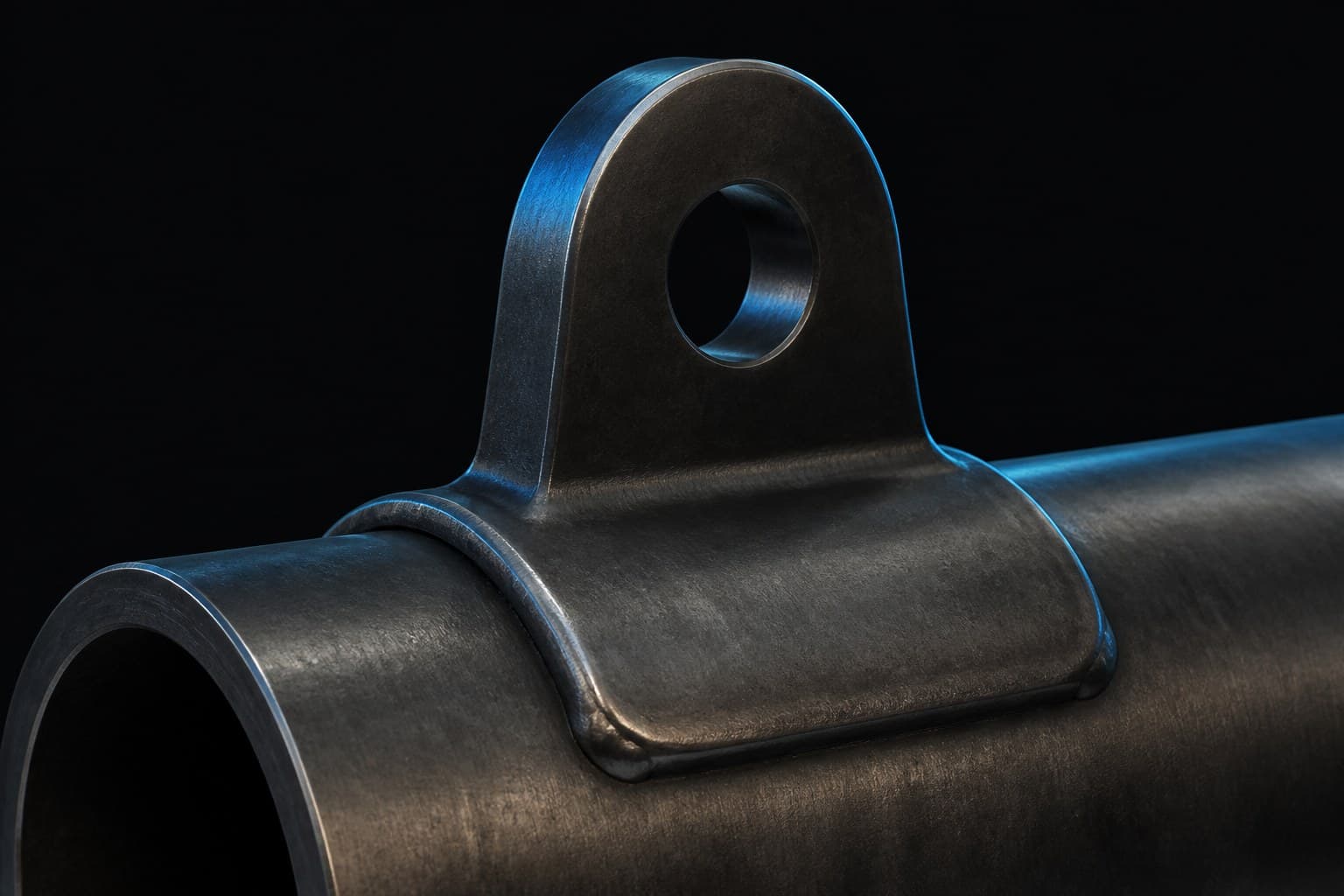 Dark-studio CAD render of a pipe lifting lug with saddle and padeye